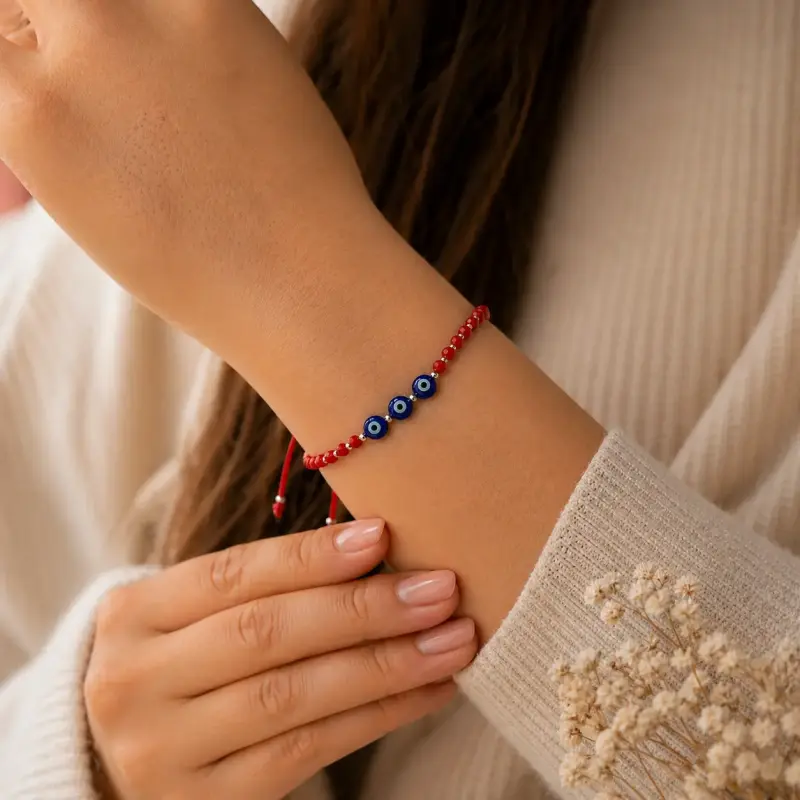 Pulsera roja con dije ojo turco - 1