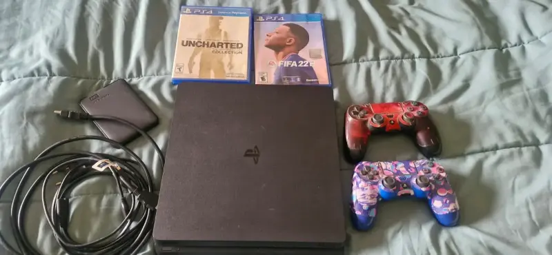 Consola PS4 con juegos y controles