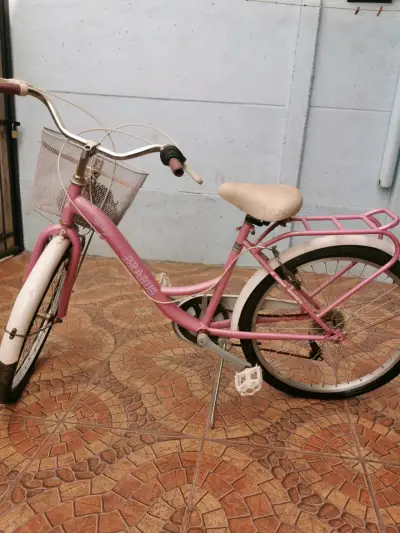 Bicicleta urbana rosada con canasto - miniatura 1