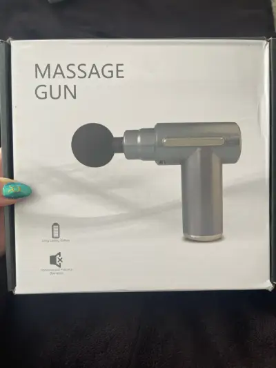 Pistola de masaje portátil - miniatura 1