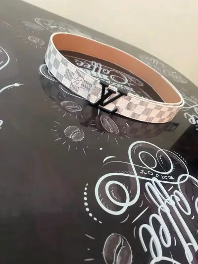 Cinturón damero beige elegante - miniatura 1