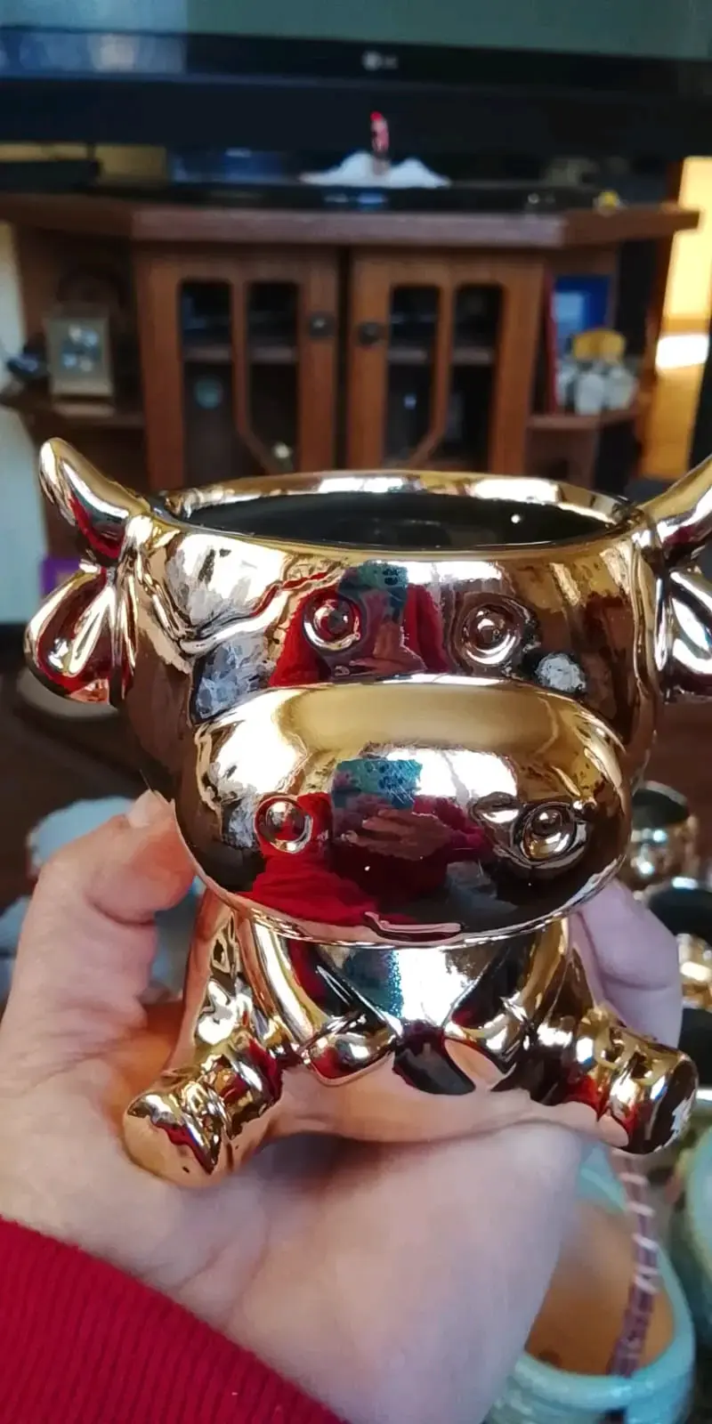 Macetero dorado vaca