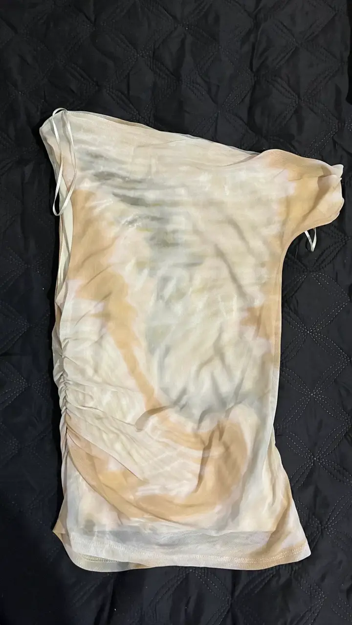 Polera sin mangas en tonos claros