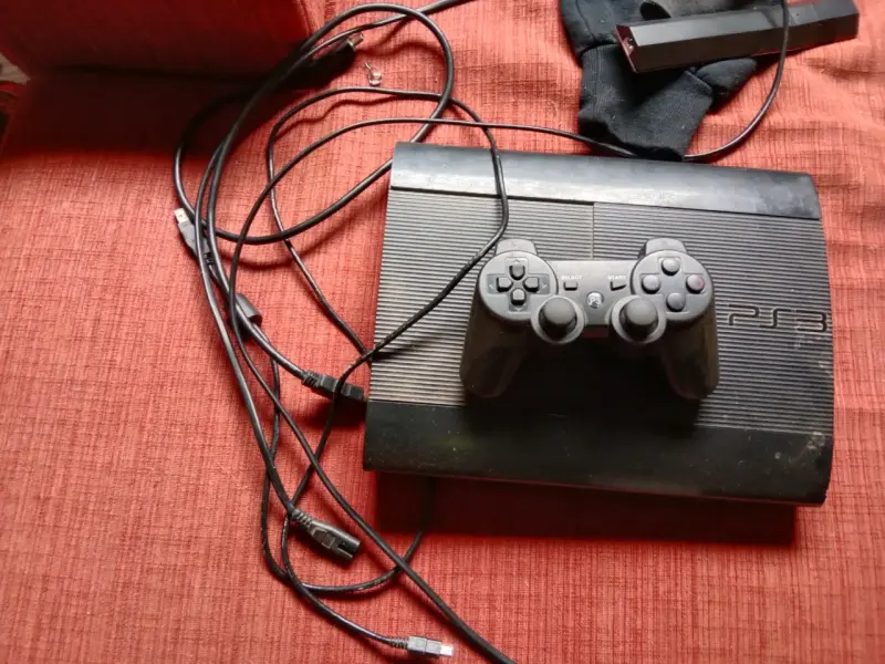 Consola de juegos PS3 con control