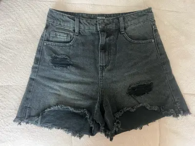 Shorts de mezclilla desgastados - miniatura 1