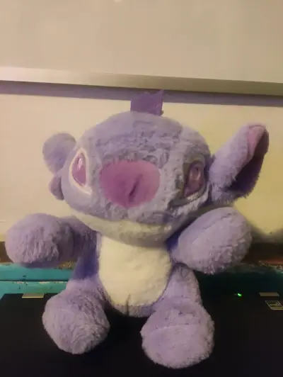 Stich morado y blanco - miniatura 1