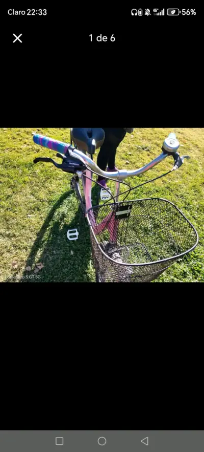 Bicicleta urbana rosa con canasto - miniatura 1