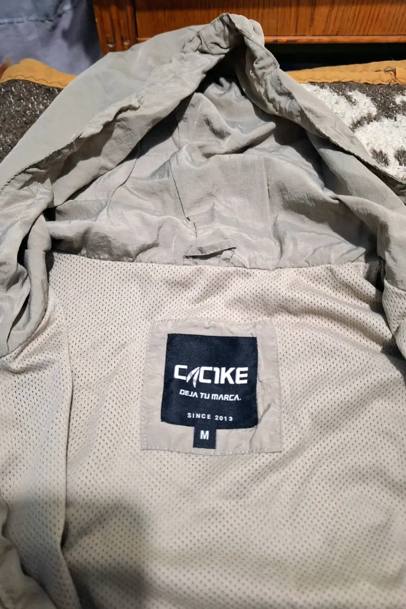 Cortaviento gris y azul marca cacike - 4
