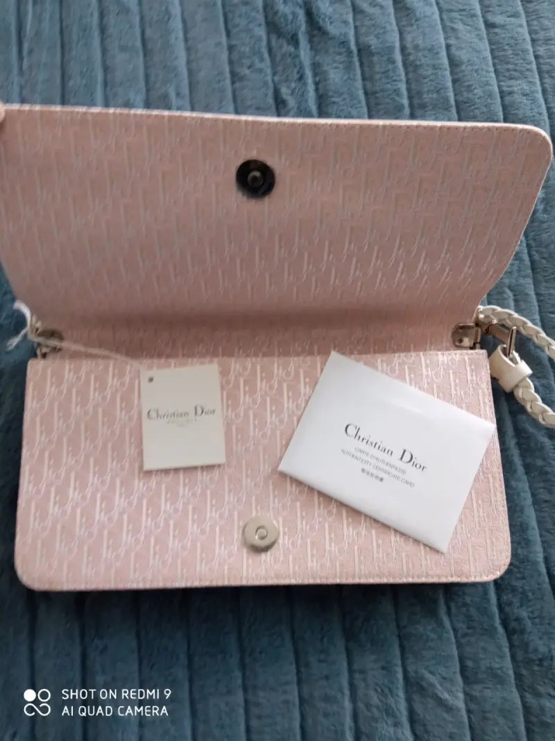 Cartera de mano blanca y rosa - 2
