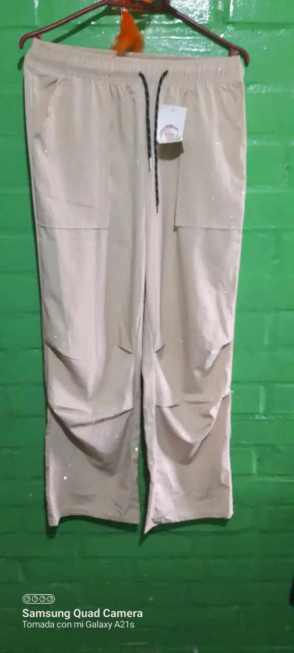 Pantalones beige con cordón y brillo - 1