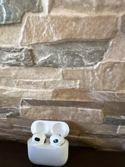 Auriculares inalámbricos blancos Apple - miniatura 1