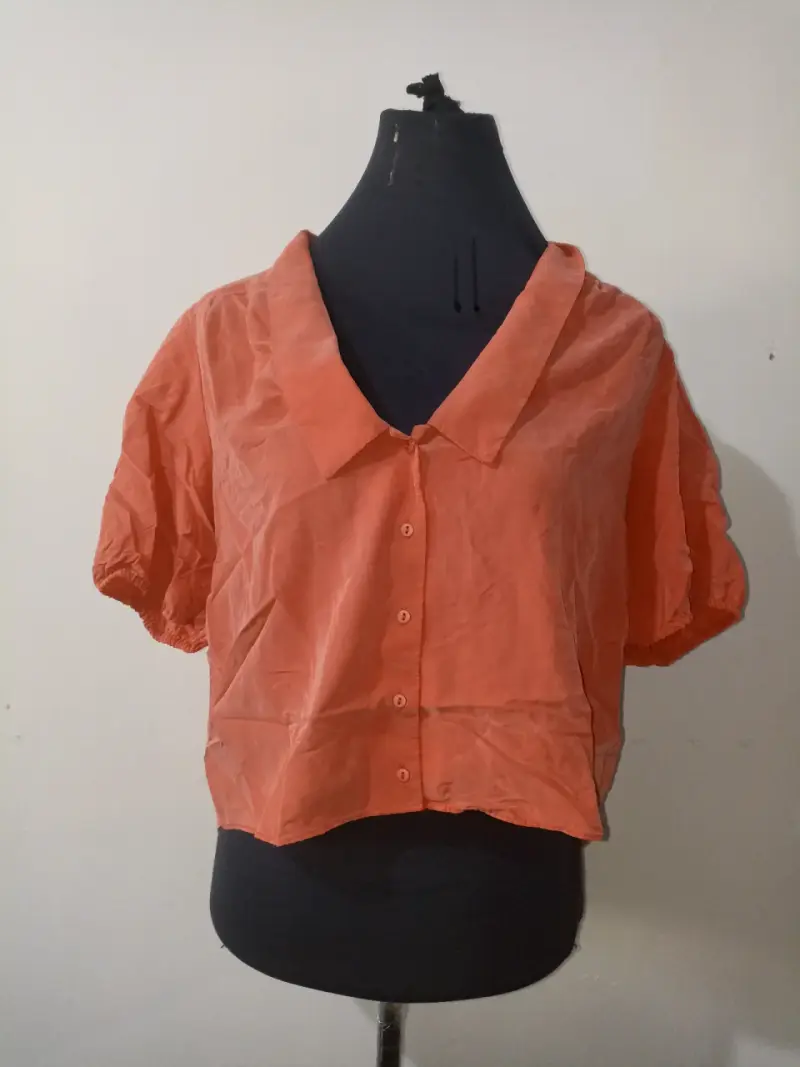 Blusa naranja de manga corta