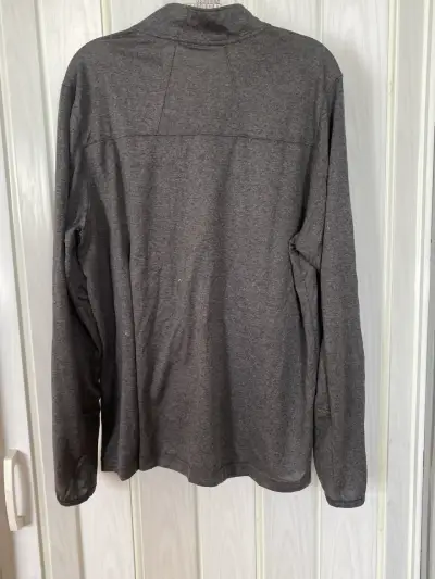 Polera gris Under Armour - miniatura 3