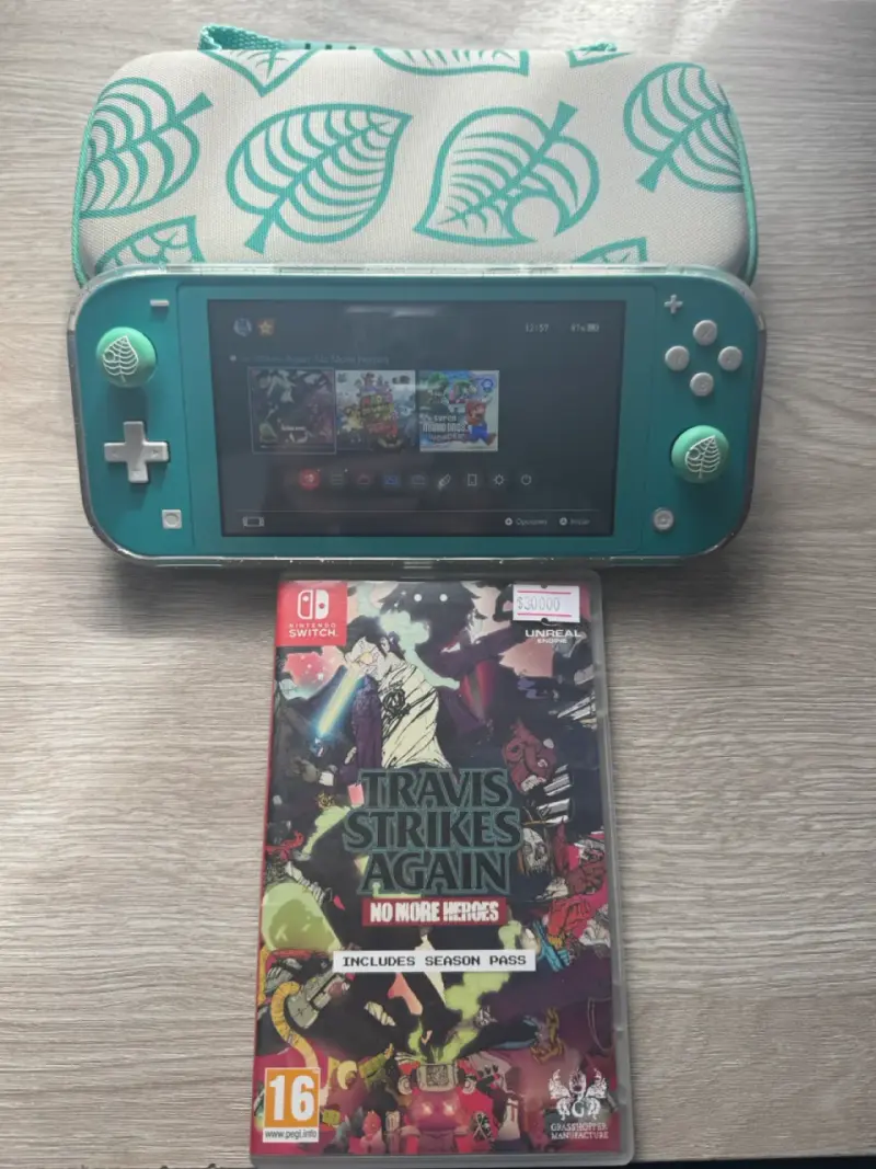 Nintendo Switch Lite turquesa + juegos - 1