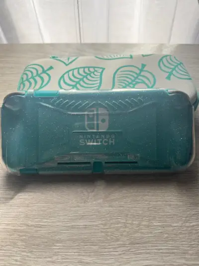 Nintendo Switch Lite turquesa + juegos - miniatura 3