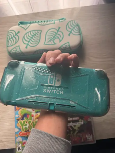 Nintendo Switch Lite turquesa + juegos - miniatura 4
