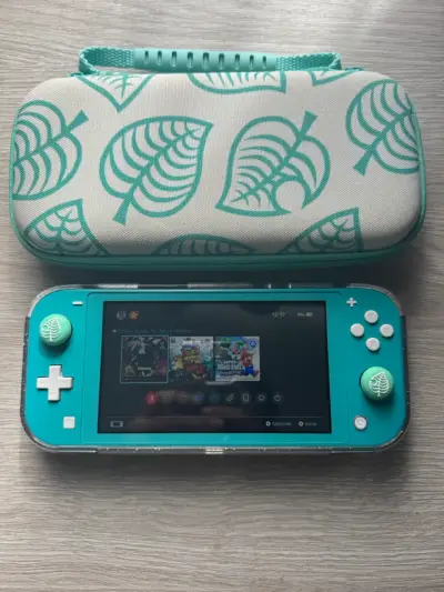 Nintendo Switch Lite turquesa + juegos - miniatura 5