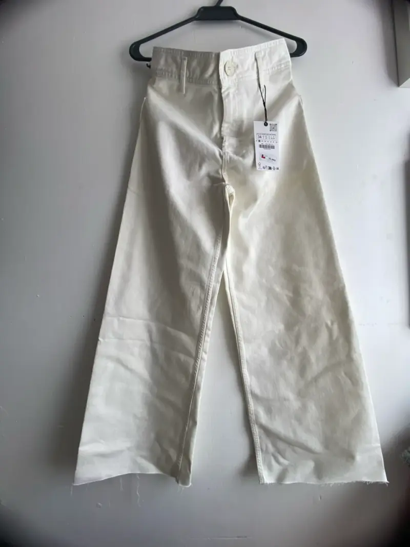 Pantalones anchos crema nuevos - 1