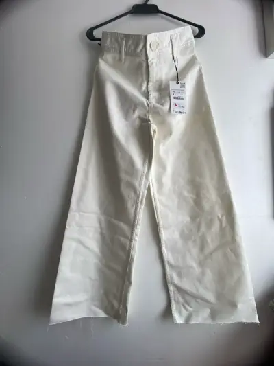 Pantalones anchos crema nuevos - miniatura 1