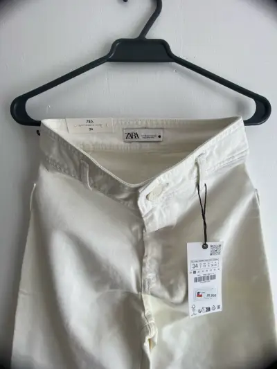 Pantalones anchos crema nuevos - miniatura 2