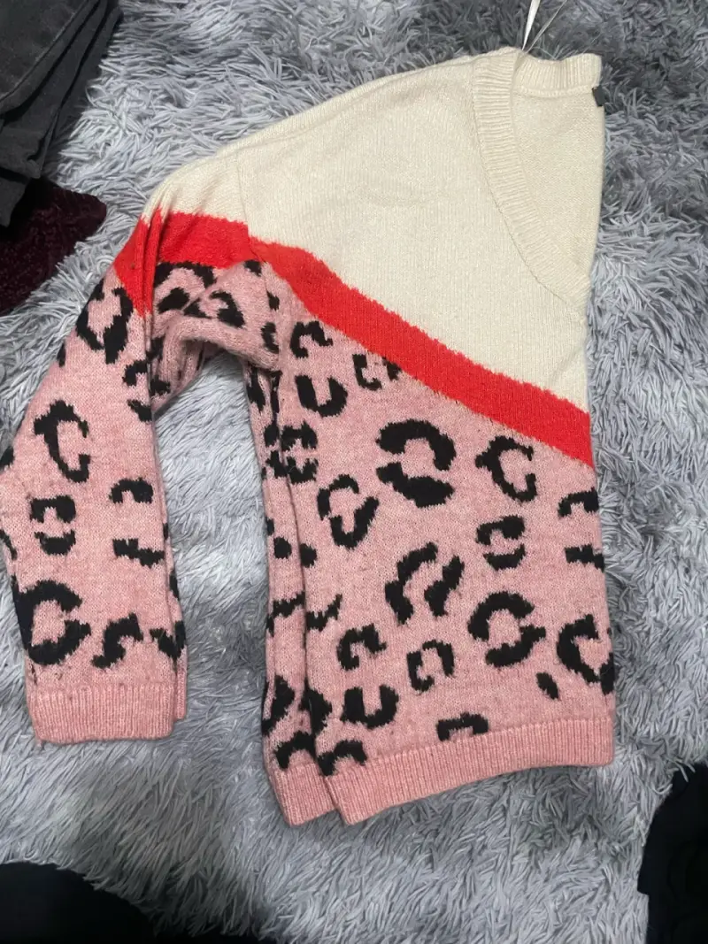 Suéter animal print rosado