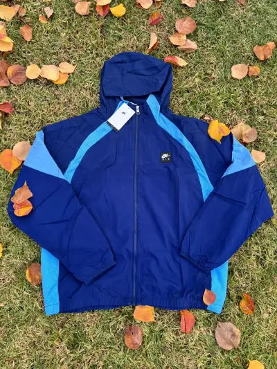 Chaqueta cortaviento azul Nike - miniatura 1