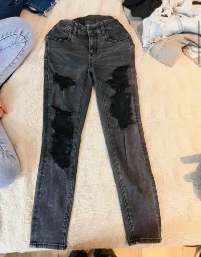 Jeans negros rasgados - miniatura 1