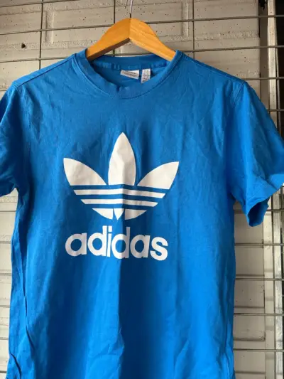 Polera azul Adidas - miniatura 1
