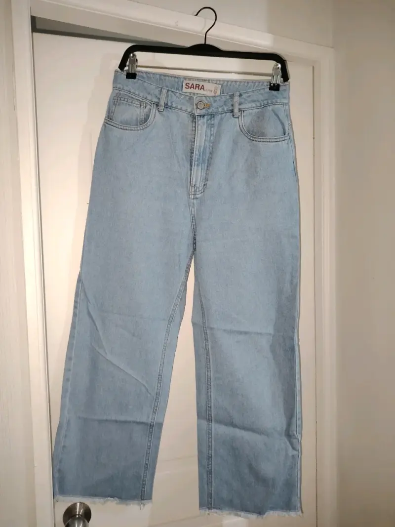 Jeans azules deshilachados - 1