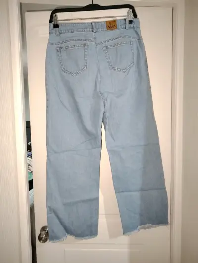Jeans azules deshilachados - miniatura 2