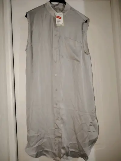 Blusa sin mangas gris - miniatura 1