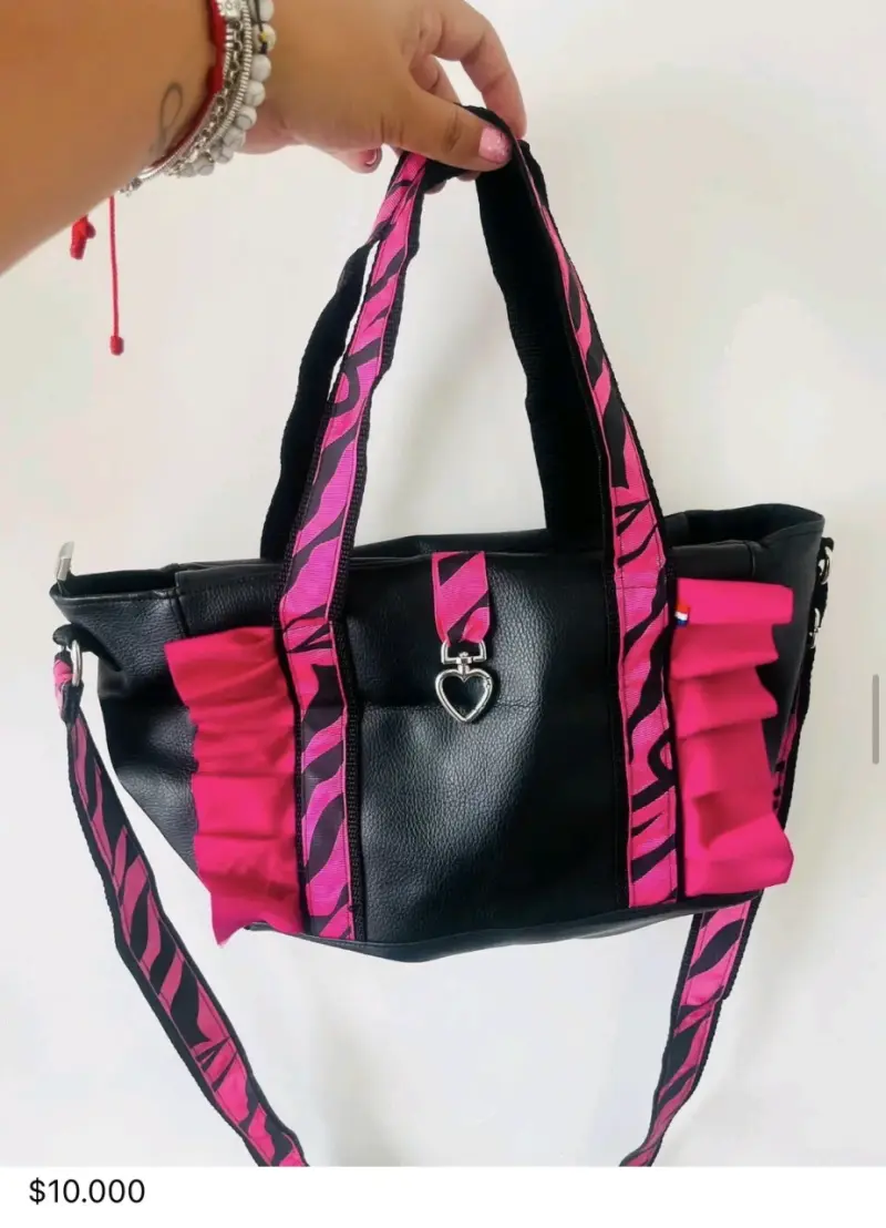 Bolso negro y fucsia con detalles - 1