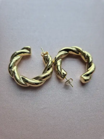 Aros dorados trenzados - miniatura 1