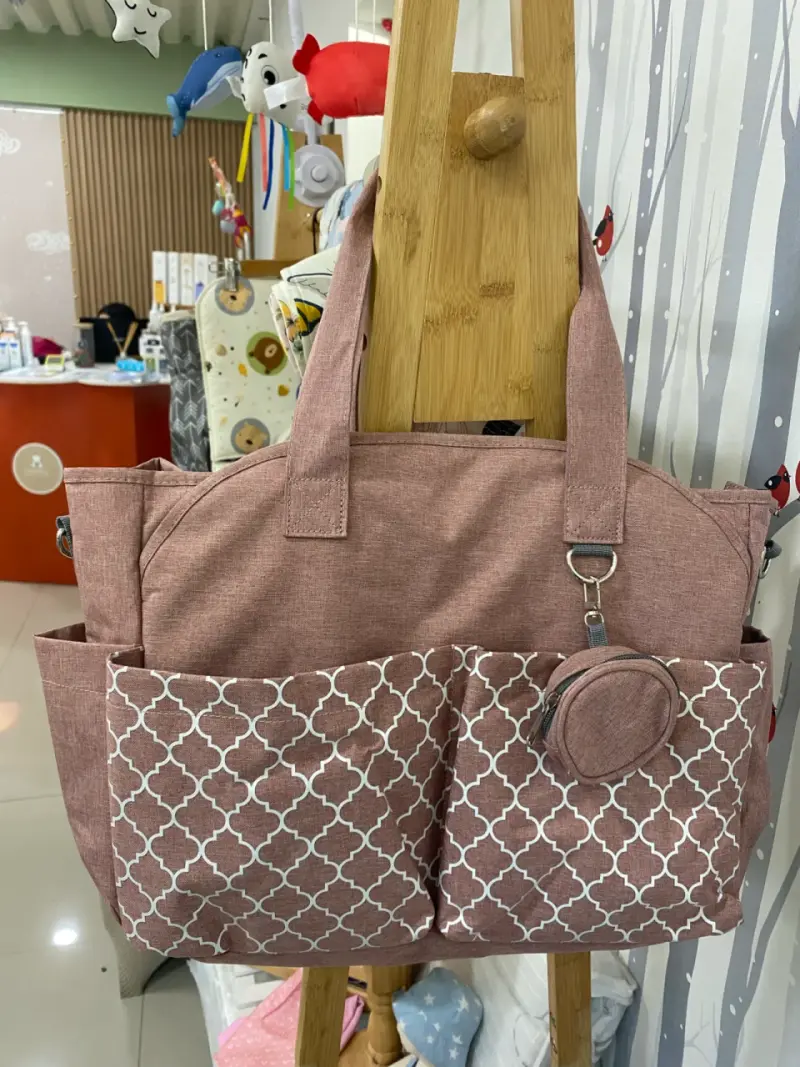 Bolso organizador maternal rosado