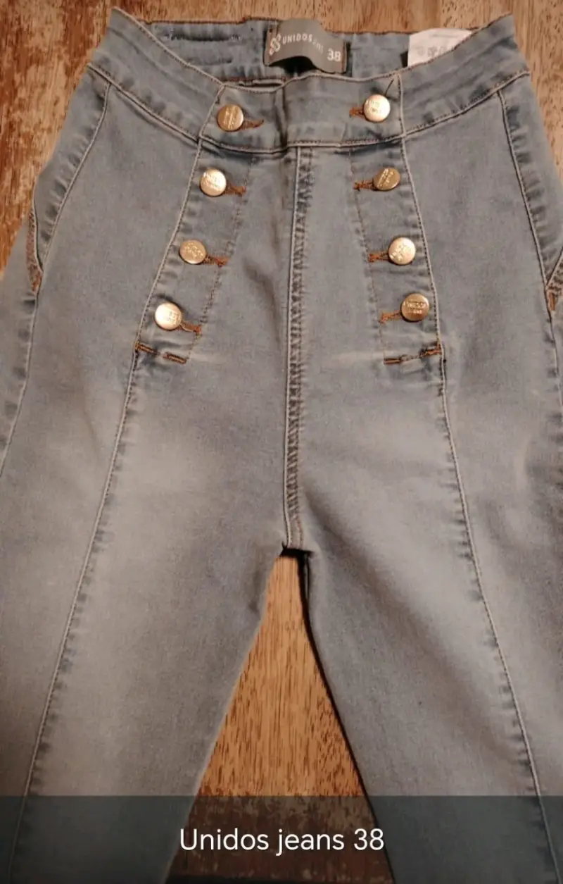 Jeans azul cielo con botones - 1