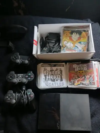 Consola PS2 con juegos y controles - miniatura 2