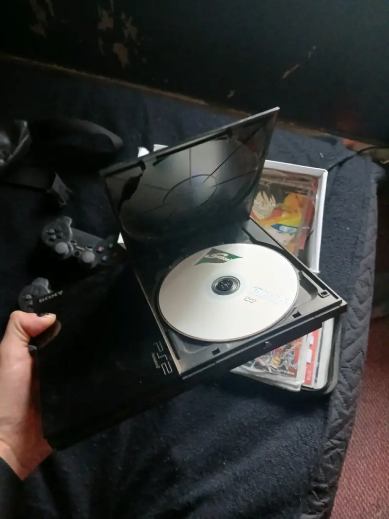 Consola PS2 con juegos y controles - 3