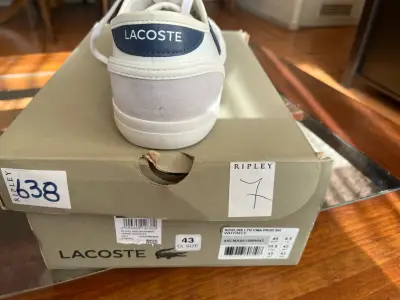 Zapatillas blancas con detalles azules - miniatura 2