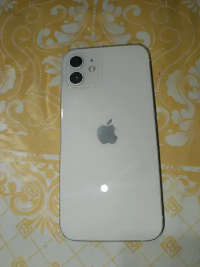 iPhone blanco en buen estado - miniatura 1
