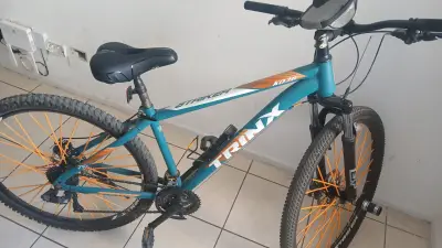 Bicicleta Trinx azul y naranja - miniatura 1
