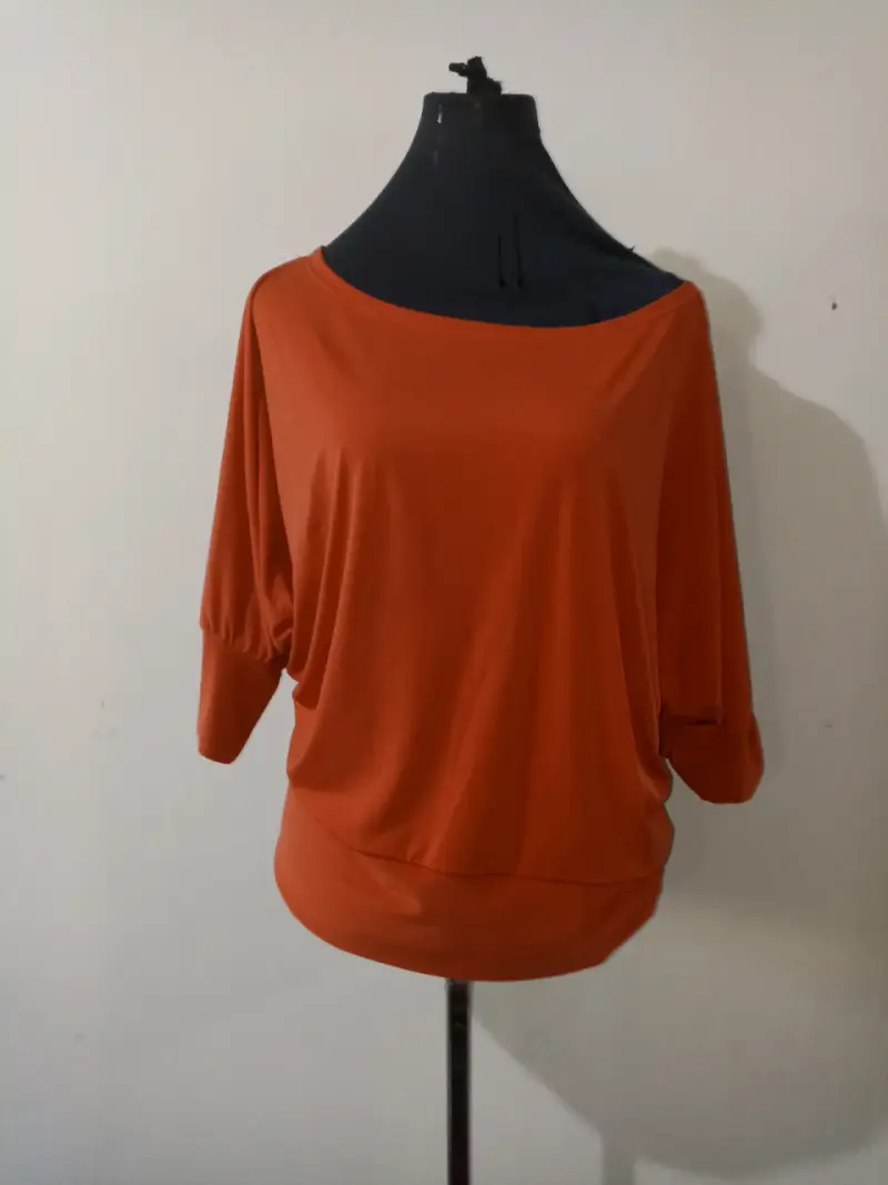 Blusa anaranjada holgada