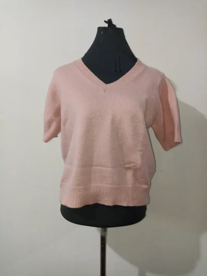 Suéter rosado de mujer