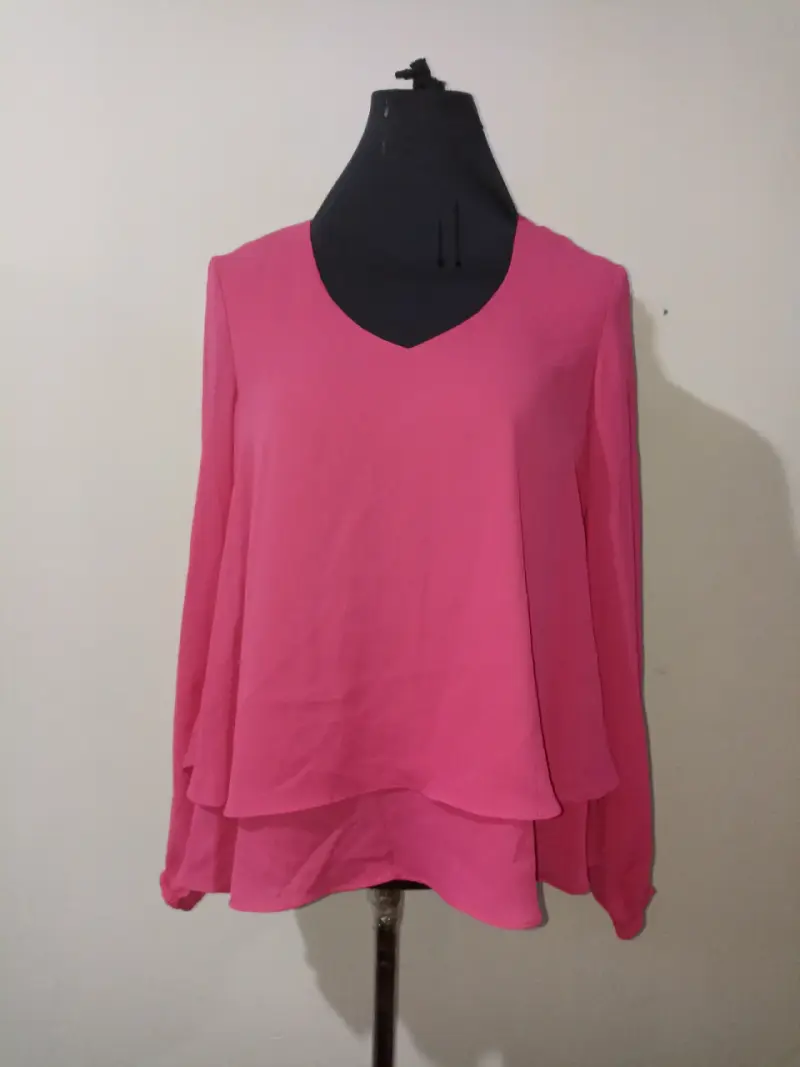Blusa rosada de mujer