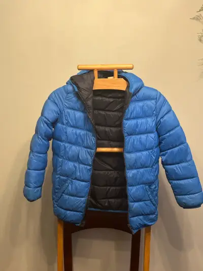 Chaqueta acolchada azul para niños - miniatura 1