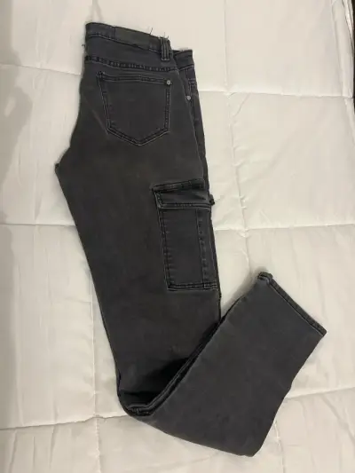Jeans oscuros con bolsillos - miniatura 1