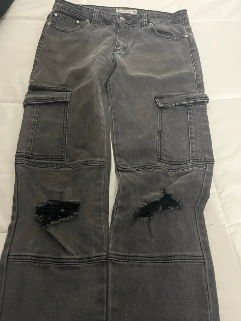 Jeans oscuros con bolsillos - 6
