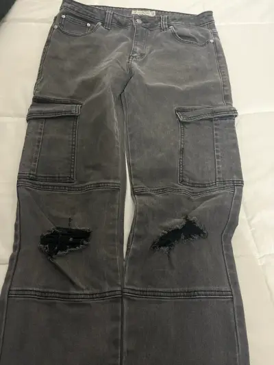 Jeans oscuros con bolsillos - miniatura 6