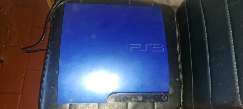 Consola PS3 azul con juegos - 3
