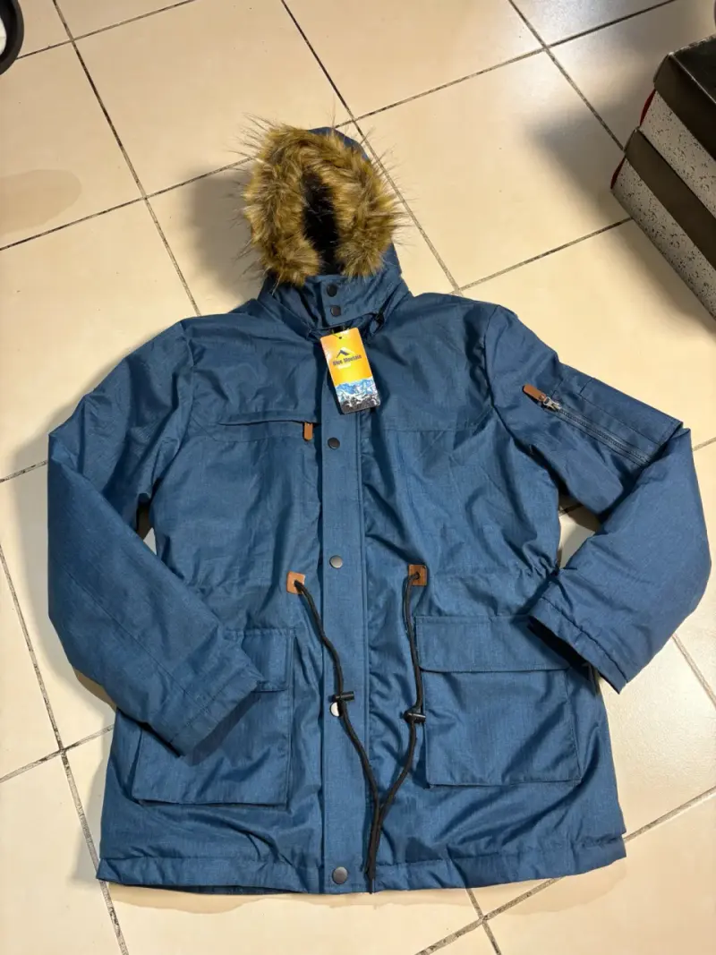 Parka azul con capucha de pelaje forrada con chipo - 1