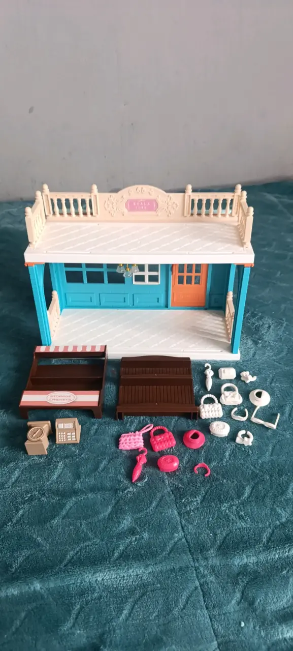 Muñecas Polly pockets y tiendita - 5